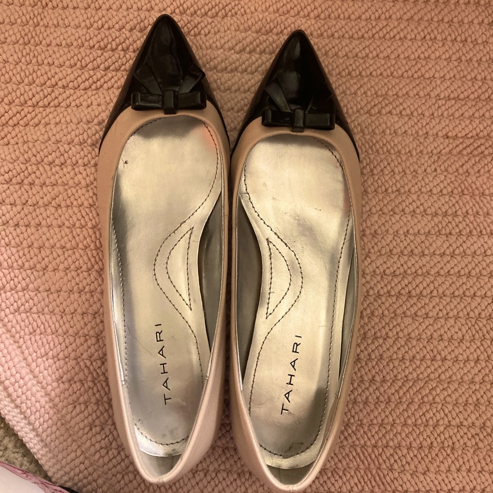 Tahari slip on kitten toe flat shoe.
